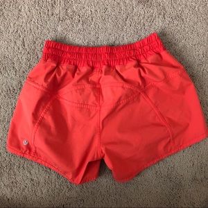 lululemon athletica Shorts - Lululemon Orange Tracker Short V 4” Shorts lululemon athletica Shorts - Lululemon Orange Tracker Short V 4” Shorts